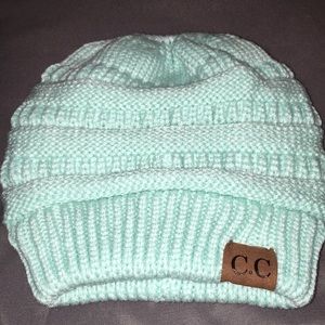 Light blue beanie with bun hole